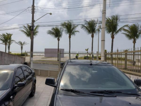 Casa de frente para o mar, pé na areia.